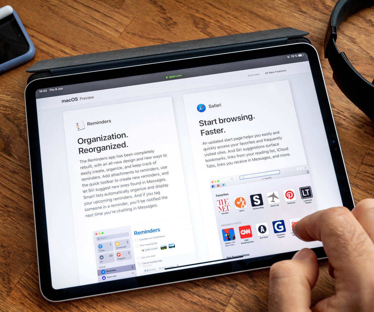 Paris, France - Jun 6, 2019: Man reading on Apple iPad Pro tablet about latest announcement of at Apple Worldwide Developers Conference WWDC - showing the new MacOS preview